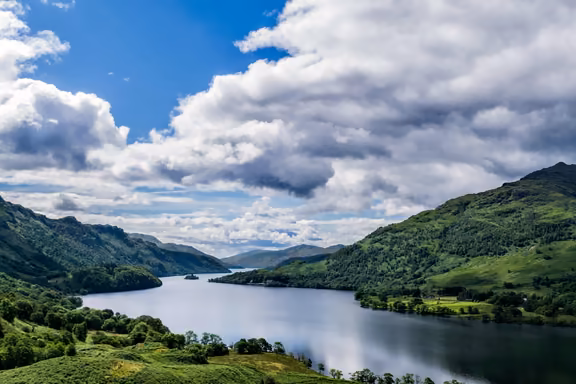 Loch Lomond between green hills