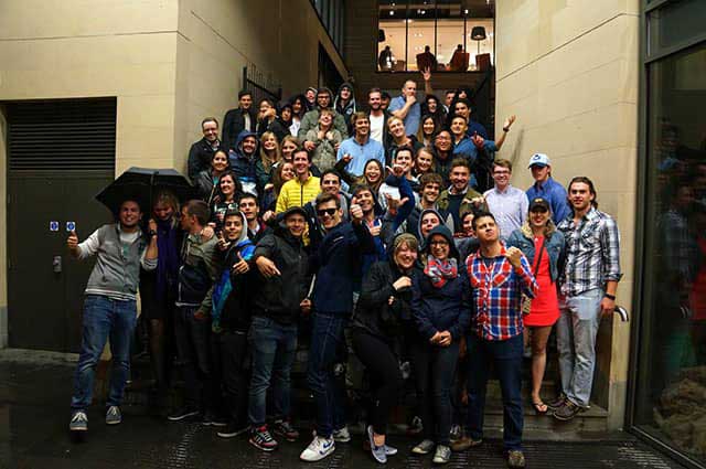 The Edinburgh Pub Crawl in front of a bar of the Old Town